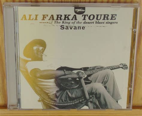  Ali Farka Touré - Savane  A melancholic desert blues serenade infused with hypnotic rhythms and mesmerizing kora melodies.